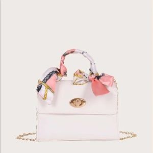 Different colors bag with elegant handle.